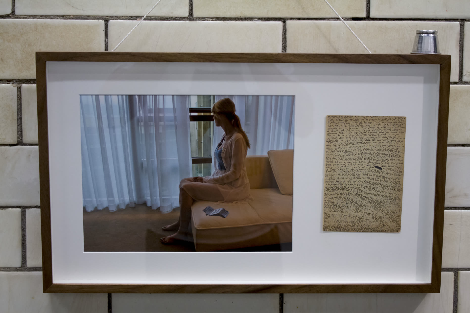 Through The Looking Glass — Mixed media — framed photograph, handwritten text, magnifying glass